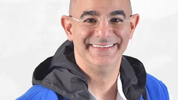 מני עוזרי
